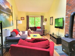 Comfortable seating with a great view of the wall mounted flat screen TV