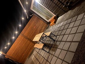 Enjoy outdoor dining and relaxation on your private patio, complete with a BBQ for the perfect al fresco experience.