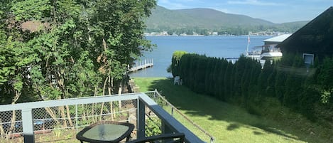 View from first floor deck. Shared private lawn/ beach /swimming area. 