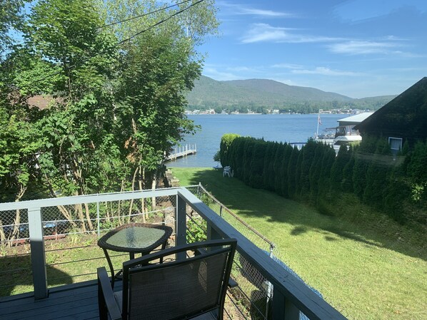 View from first floor deck. Shared private lawn/ beach /swimming area. 