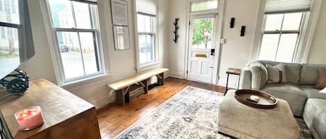 Living room on main floor w/ smart tv