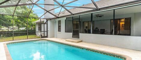 You're own screened-in private pool for a refreshing dip anytime