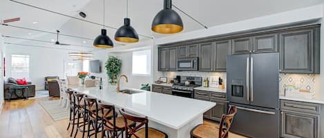 Large kitchen island with plenty of space to gather.