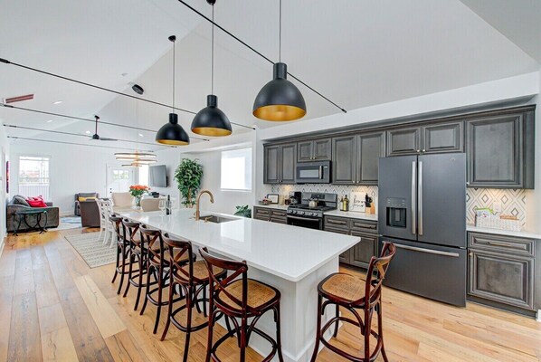 Large kitchen island with plenty of space to gather.