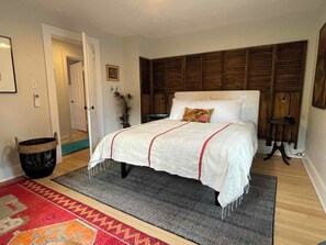 A warm and inviting bedroom with very good mattress and bedding