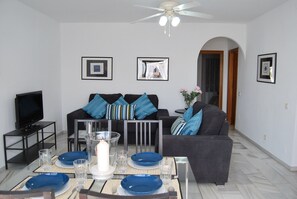 Spacious living room with dining area 