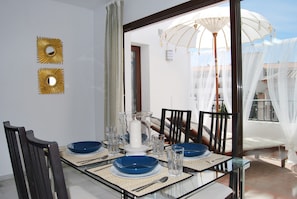 Dining area facing the balcony