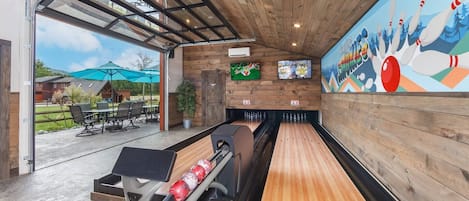 Let the good times roll with limitless games of duckpin bowling!