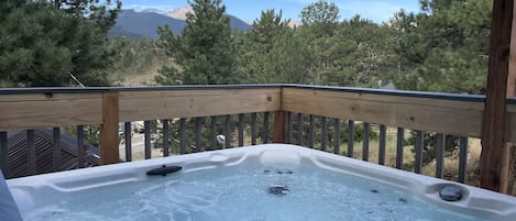 Private hot tub w/ view of Longs Peak and the range. 