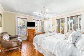 King Bedroom. Upstairs with private screened in balcony overlooking the pool.