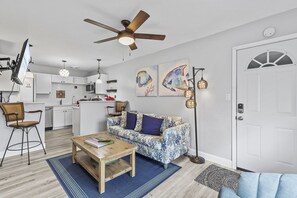 Living Room with Sleeper Sofa and Kitchen Area