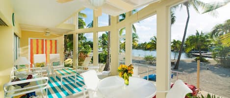 The screened lanai with water views will become your go-to spot to relax and recharge.