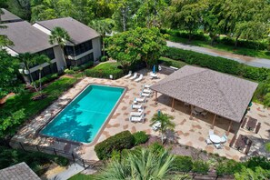 The Heated Community Pool and Large Pool Deck and Pavilion are Located Right Behind the Condo Building