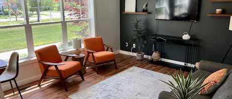 Open Living room with lots of natural light. 