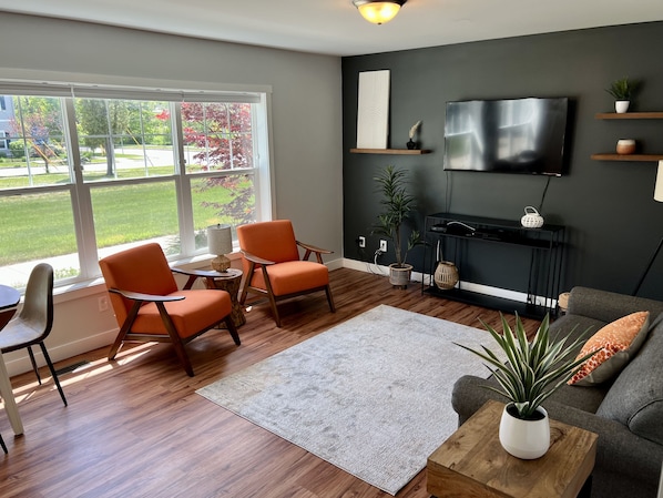 Open Living room with lots of natural light.