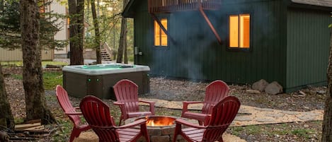 Embrace of the woods while toasting marshmallows by the fire pit.