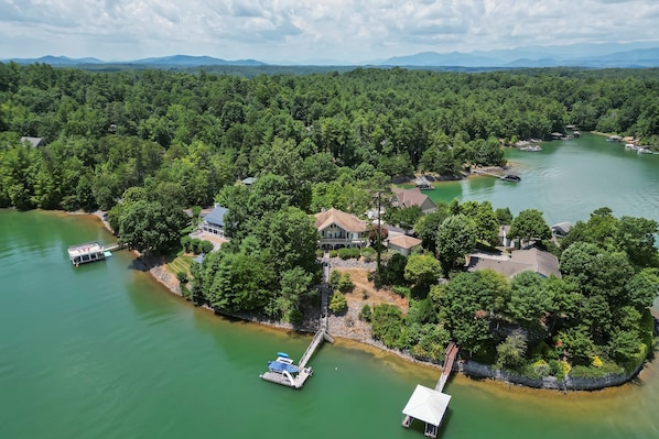 Middle home with open dock and slide. Enjoy open water and cove views.