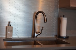 All appliances are brand new and feature sleek stainless steel finishes.