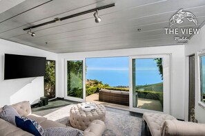 Watch TV while enjoying the ocean views.