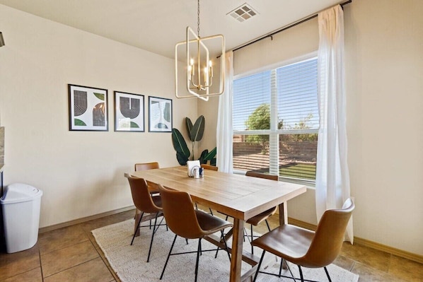 Serve your delicious meals easily at the lovely dining table.