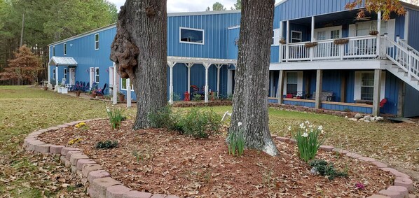 VRBO is the upper floor of the section to the right of the tree.
