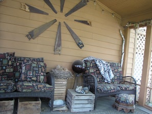 The screened in room holds many nature treasures .