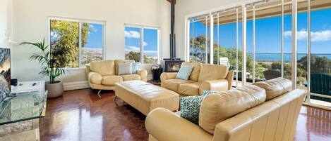 Lounge room, high ceilings, spectacular views