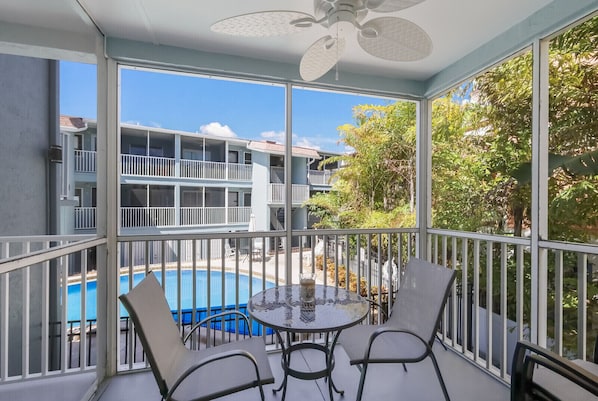 Outdoor screened lanai perfect for morning coffee