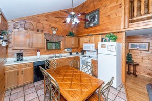 The kitchen comes stocked with essentials to cook those family meals and the table provides seating for 6