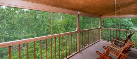 Wonderful wooded view from the deck off the kitchen