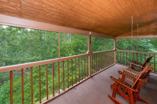 Wonderful wooded view from the deck off the kitchen