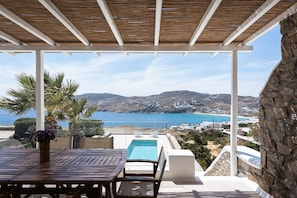 Outside Dining Area With Pool View