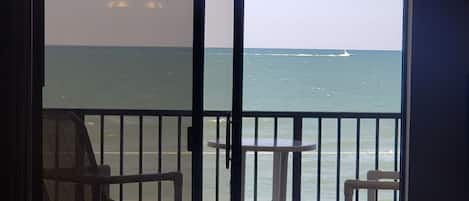 View of ocean from living room, primary and secondary bedroom. 