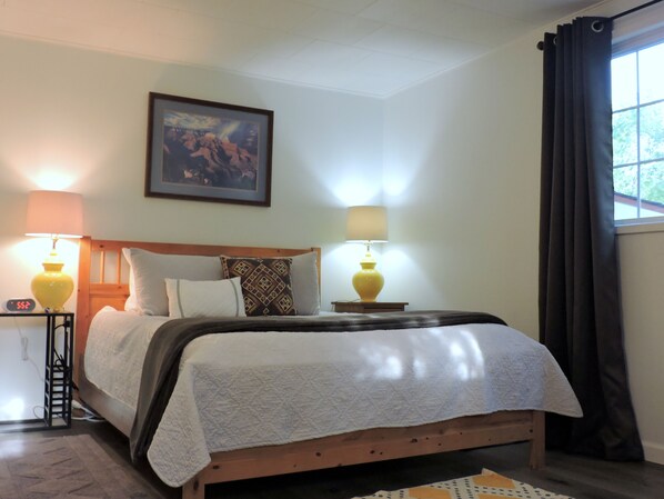 A Queen Size Bed with NovaForm Mattress,  Cotton Linens, Bedside Tables!