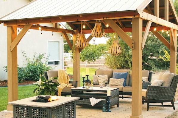 Outdoor pergola with comfortable outdoor furniture