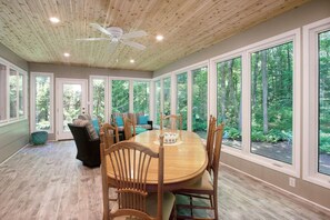 Here you can see full wall of windows lets the outside in.