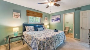 Master bedroom w/ attached full bathroom & 33'' TV w/ roku 4k streaming device