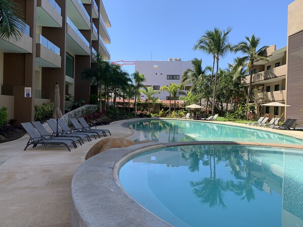 Large two bedroom condo with pool and beach views