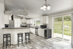Kitchen with doors out to your deck and pasture