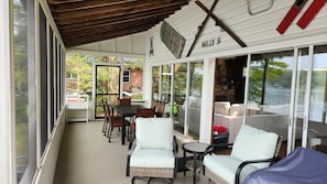 30" screened in porch 10' from the edge of the lake for lounging and dining.