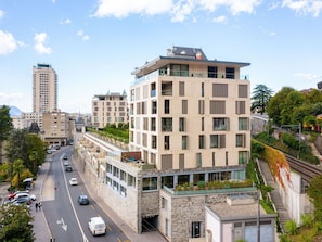 Cloud, Sky, Building, Window, Plant, Car, Tree, Infrastructure, Vehicle, Urban Design
