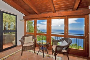 The little bright living room with a nice and wide view on the sea