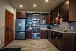 This beautifully remodeled kitchen is fully stocked and a perfect place to entertain!