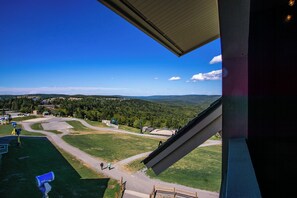 This balcony contains seating for 4 people, with plenty of space and gorgeous views!