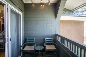 This balcony contains seating for 4 people, with plenty of space and gorgeous views!