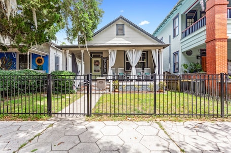 Front porch and backyard are fully fenced. Street Parking is in front of house