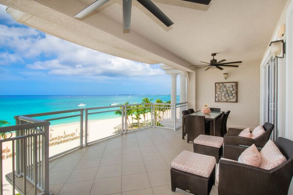 Furnished balcony with oceanfront views.