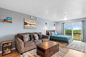 View of Living Area - Queen Size bed and a queen-sized fold out couch