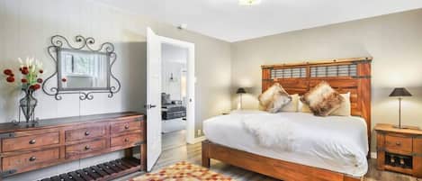 The stately master bedroom is a restful retreat that boasts a king-size bed, matching nightstands and lamps, a dresser, large, walk-in closet and an en suite bathroom.