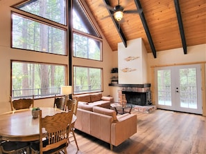 High ceilings and windows allow great views of forest and stars at night.